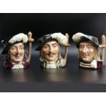 Three Royal Doulton large character jugs, Porthos D6640, Aramis D6451 and Athos D6452. 19 cm. UK