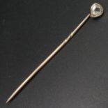Victorian yellow metal (un-tested) diamond set stick pin. Diamond approx. 5 x 5.7 mm. 52 mm long.