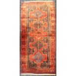 Rich blue and red ground Persian Hamadan Lory village rug. 300 cm x 135 cm. Collection only.