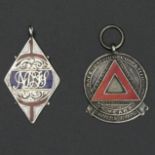 A silver and enamel Safe Driving Competition fob and a fancy initialled example. 42 mm long. 14.4