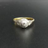 18 carat gold platinum and diamond cluster ring, size P. 3.2 grams. Top 8 mm band 1.9 mm. UK Postage