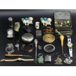 A box of collectable items, including a silver handled button hook, Chester 1911, novelty pin