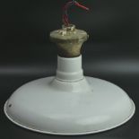 A vintage enamel ceiling light. 38 cm diameter. UK Postage £30.