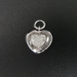 18 carat white gold diamond heart set pendant. 2.1 grams. 16.3 x 12.7 mm. UK Postage £10.