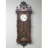 Victorian Vienna walnut cased, striking movement, wall clock. 132 cm high x 42 cm wide. Collection