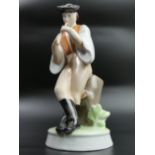Zsolnay Pecs Hungary porcelain figure of a man playing a flute. 26.5cm high. UK Postage £15.