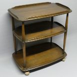 Ercol elm tea trolley on castors. 71 cm wide x 46 cm high. Collection only.