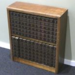 Teak bookcase containing a full set of 1967 encyclopaedia Britannica. Collection only.