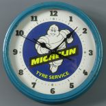 Metal Michelin advertising wall clock. UK Postage £15.