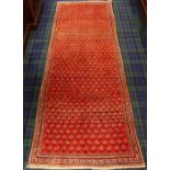 Hand woven Persian Surok Mir stylised leaf design full pile rug. 294 cm x 106 cm. UK Postage £30.
