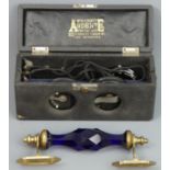 Mr R.H. Dents Ardente early hearing aid in the original box and a Bristol blue glass and brass