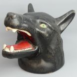 An early 20th century Folk Art wolf's head. 27 X 24 X 21 cm. UK Postage £30