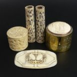 A finely carved 19th century Chinese ivory box and cover, an ivory panel, an ivory mounted brass pot