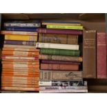 A box of books including Penguin paperbacks, Livingstone's Missionary Travels and The Catch of the