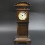 1920's oak miniature long case clock. 28 cm high. UK Postage £15.