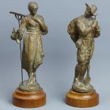 A pair of late 19th century spelter figures of country folk. 21.5 cm high. UK Postage £15.