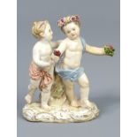 19th century Meissen porcelain figure group of two children, no. 2990. 12 cm high. UK Postage £15.