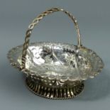 Georgian silver pierced swing handle bon bon dish, London 1766. 108 grams. 15 cm long x 11.5 cm