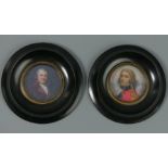Two ebony framed portrait miniatures. 13 cm diameter. UK Postage £15.