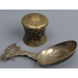 Victorian ornate silver spoon, London import mark for 1891 and a George V silver pot and cover