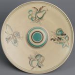 Poole Art Deco, hand painted stylised fruit design, pottery footed dish, circa 1935. 33 cm diameter.