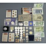 A collection of coins and old bank notes, including a Jo Page £5 note 51E 344780. UK Postage £15.