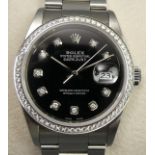 Rolex stainless steel oyster perpetual date adjust watch, with a black diamond set dial and