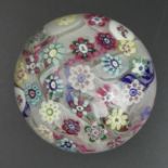 French St. Louis glass millefiori paperweight, featuring random canes, including two animal