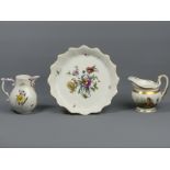 18th century Meissen porcelain jug, an early 19th century porcelain jug and floral dish,23.5 cm in