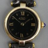 Ladies Cartier Paris, Vermeil .925 silver, black face, quartz movement wristwatch. 24 mm dial (