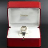 Ladies 18ct and Stainless Steel Cartier Santos quartz watch, with the original box and papers. Watch