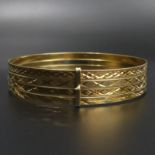 A quartet of 14ct gold bangles with diamond cut decoration. each bangle 3.1 mm wide. 22.4 grams.