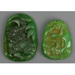 Two carved Jade pendants. 62 mm and 50 mm long. UK Postage £12.