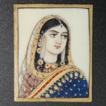 An old finely painted Indian miniature watercolour portrait on ivory. 28 mm x 37 mm. UK Postage £12.