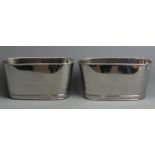 A pair of oval Champagne ice buckets with quotes from Napoleon and Lily Bollinger to the sides. 30 x