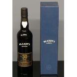 A bottle of Blandy's 30 year Madeira. UK Postage £15.