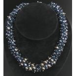 A cultured tinted pearl and crystal choker necklace. 45 cm long x 2 cm wide. 149 grams. UK