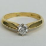 18 carat gold diamond solitaire, approximately .25ct, London 1990. Size K, top 5mm, band 2.2 mm. 3.1