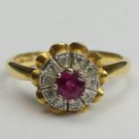 18ct gold ruby and diamond ring, Birmingham 1970. Size M, top 10 mm, band 2.2 mm. 4.4 grams. UK