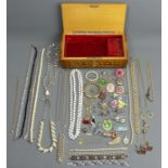 An inlaid musical box containing a quantity of costume jewellery, including a Trefari necklace and