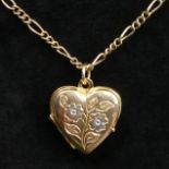 9 carat gold locket and Figaro link 38 cm chain. 6.3 grams. UK Postage £12.