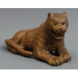 Finely carved oriental carved hardwood tiger figure. 9.5 cm x 5 cm. UK Postage £12.