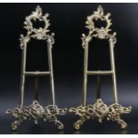 A large pair of brass easels for displaying pictures. 40 cm high. UK Postage £18.