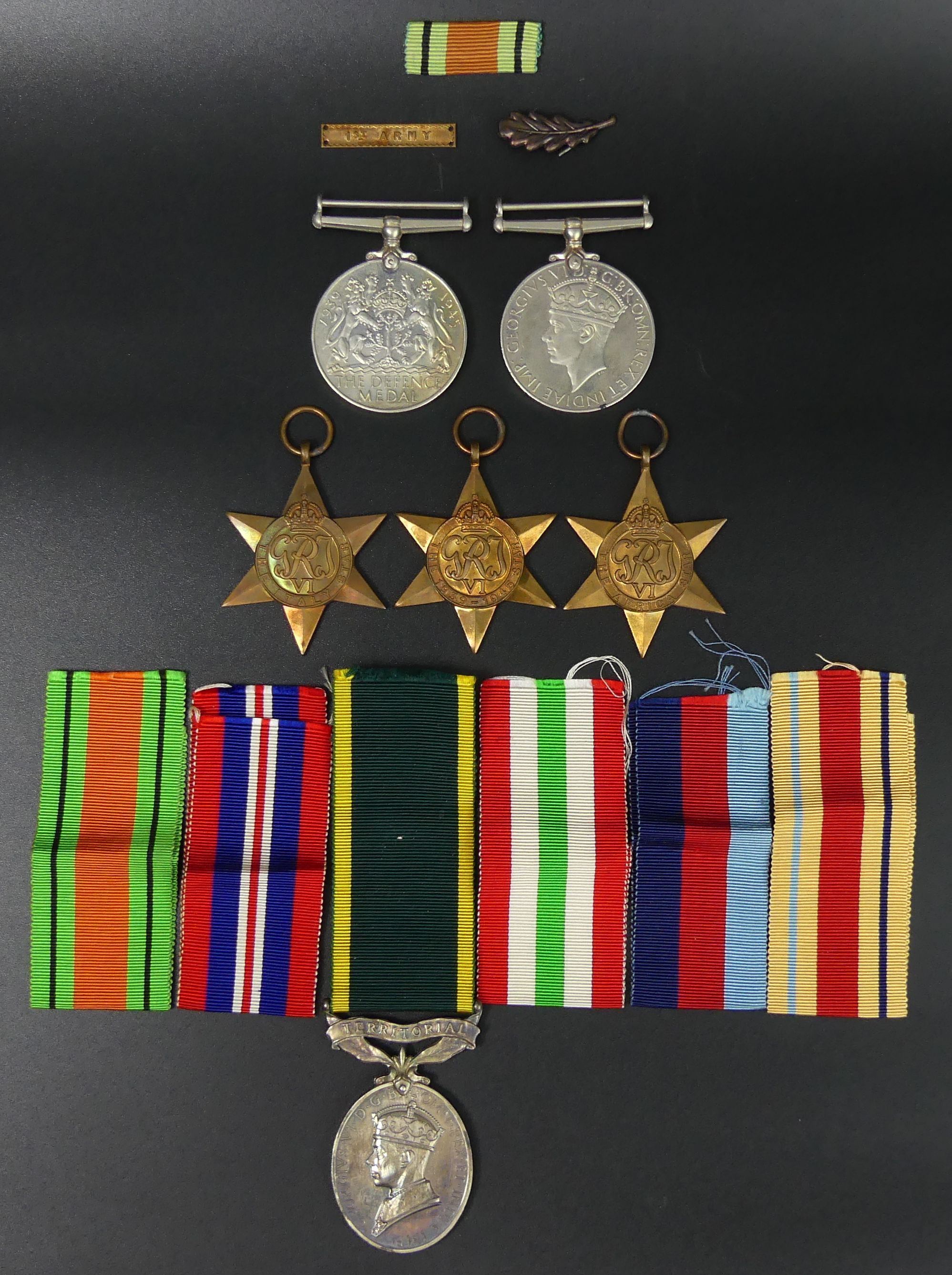 World War II campaign medals and a Territorial Efficient Service medal. 873552 SJT T.Plato R.A. UK