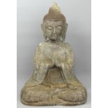 A large bronze seated figure of Buddha. 42 cm high. UK Postage £30.