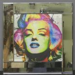 A bevelled mirror glass framed picture of Marilyn Monroe. 55 cm square.