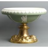 A Victorian Wedgwood? green jasper dip comport on a gilt metal stand. 27 cm diameter x 19 cm high.