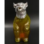 Amber glass and silver plate bear design claret jug. 22.5 cm high. UK Postage £16.