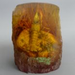 An amber type fossilized insect. 9.5 cm high. UK Postage £15.