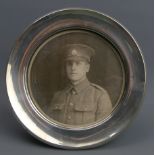 George V silver easel back photograph frame.145 mm diameter. UK Postage £12.